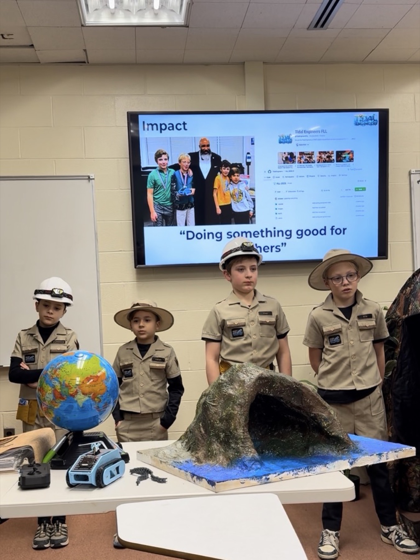 Tidal Engineers reviewing robot strategy on a whiteboard