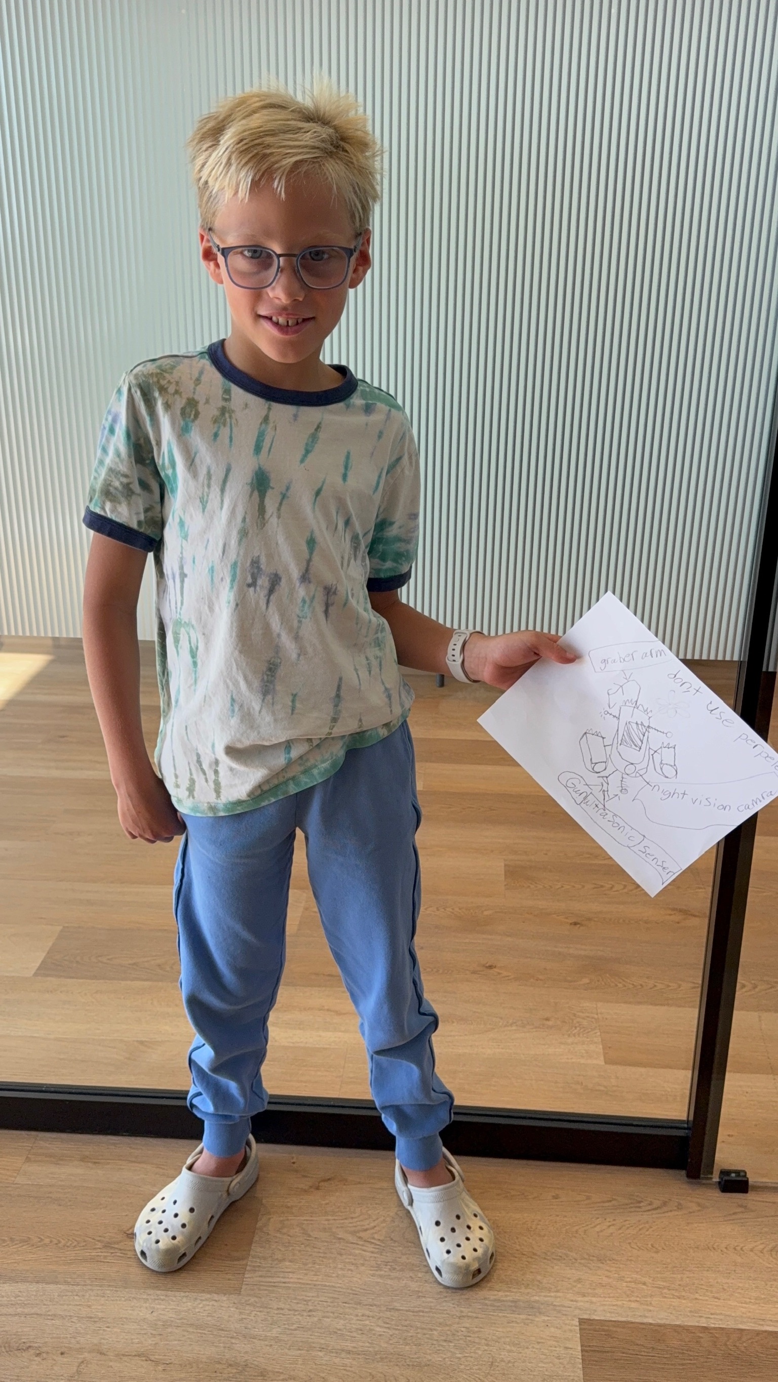 Tidal Engineers teammate showing a rover idea sketch